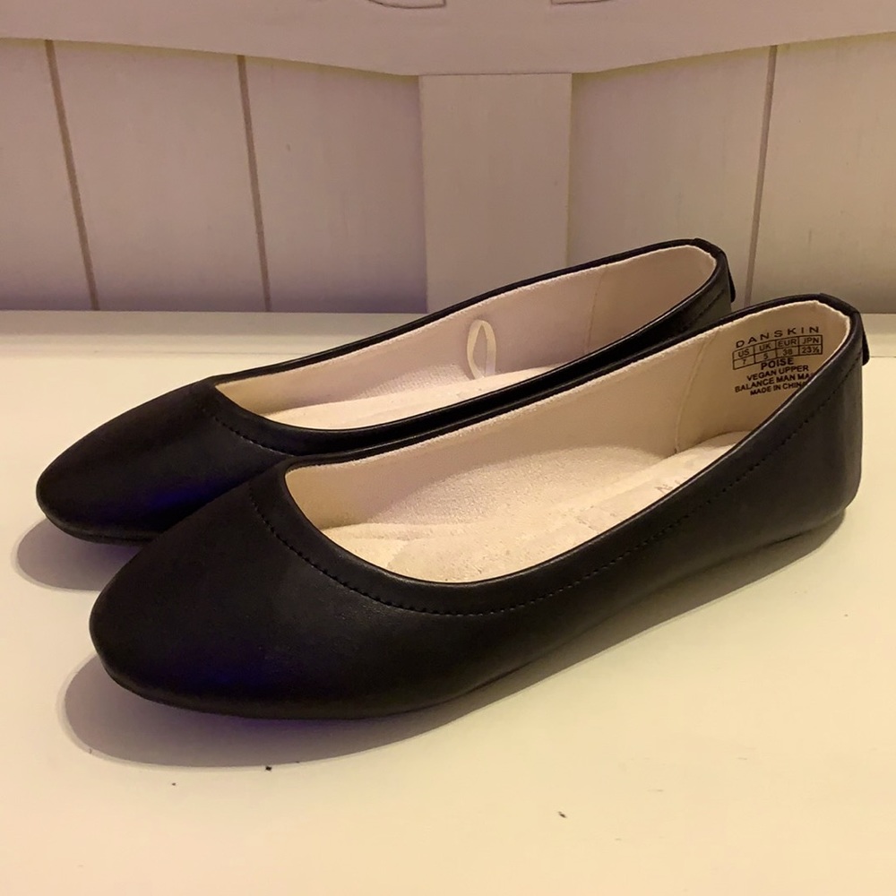 Black flats never worn.